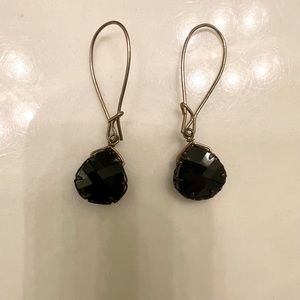 Black and gold dangly earrings. 1.5 inches long. Bead is about 0.5x0.5 inch.